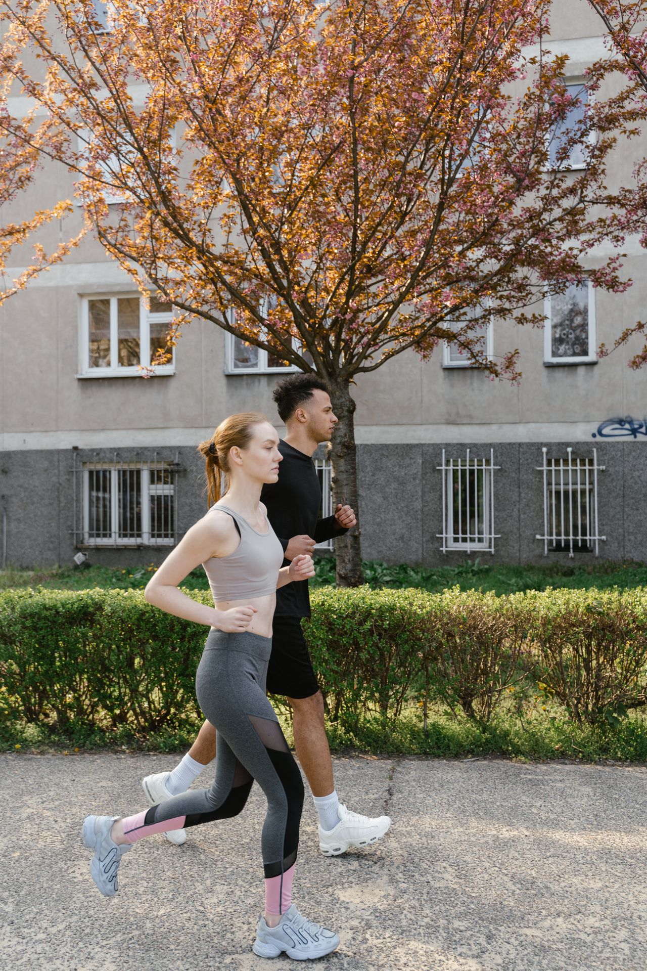 The optimiser, two runners on a morning run through the city